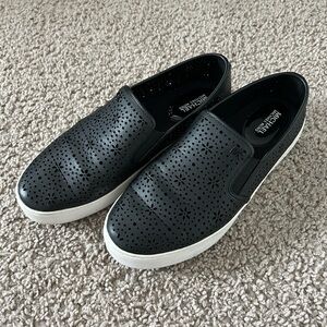 Michael Kors black leather cut out slip on shoes